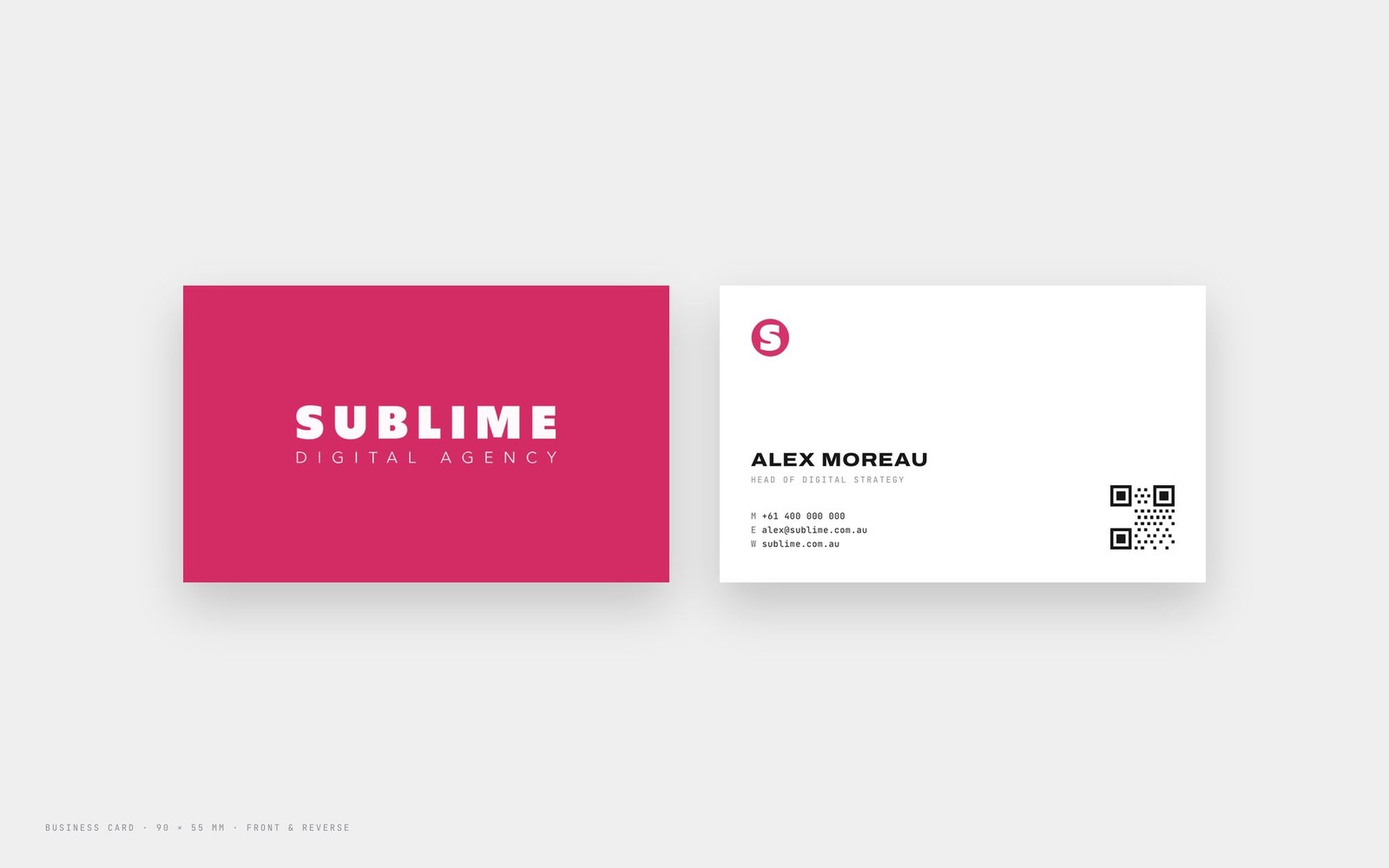 Business card, front and reverse. The QR sits on the contact side so the logo face stays clear